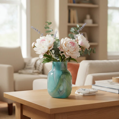 Blue marble effect glass vase with a smooth glossy finish, featuring a rounded body and short cylindrical neck, designed as a modern decorative piece for home decor styling.