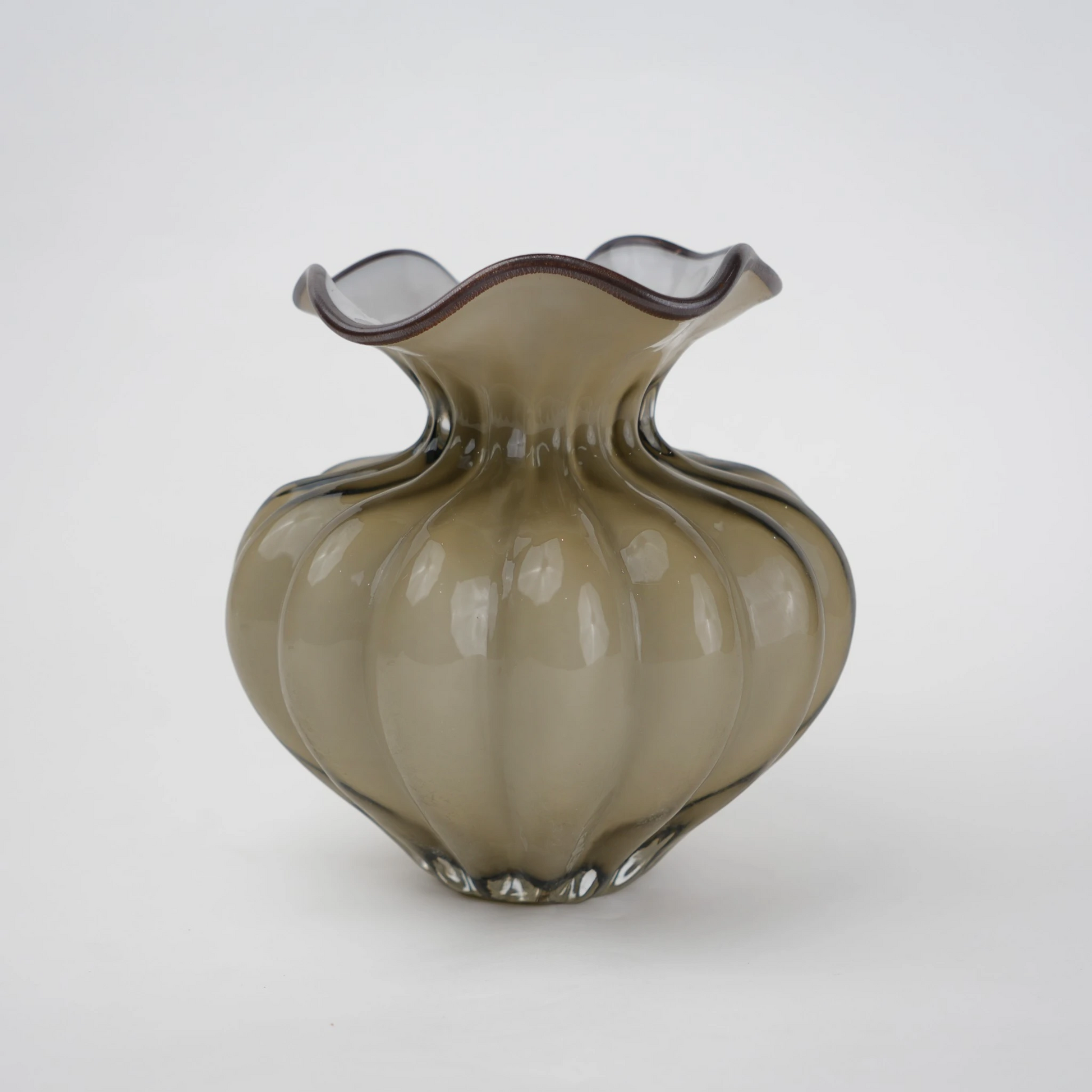 Ribbed glass vase with a smoky beige tint, featuring a rounded bulb shape and a wavy flared rim, designed as a modern decorative piece for home decor styling.