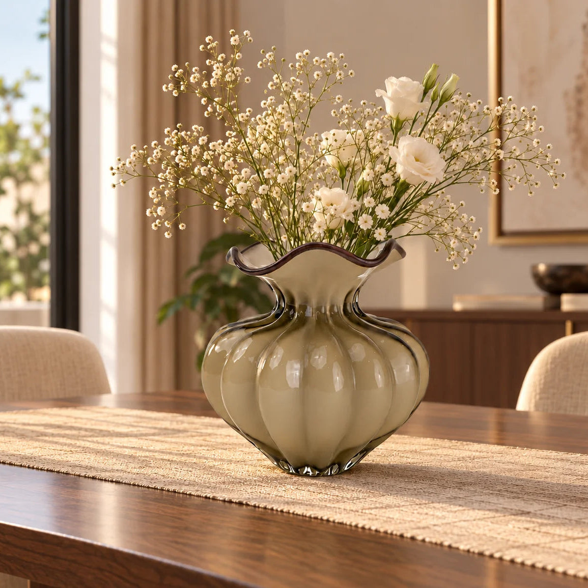 Ribbed glass vase with a smoky beige tint, featuring a rounded bulb shape and a wavy flared rim, designed as a modern decorative piece for home decor styling.