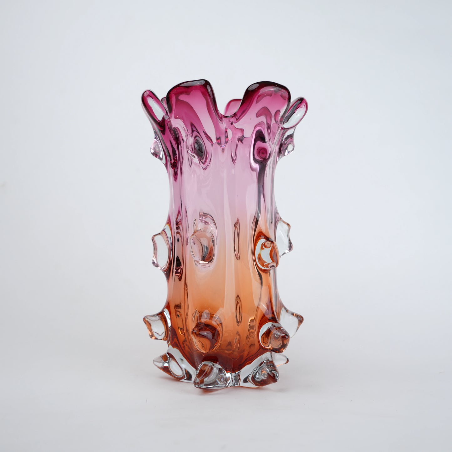 Pink and amber gradient glass vase with sculpted textured design for modern home decor