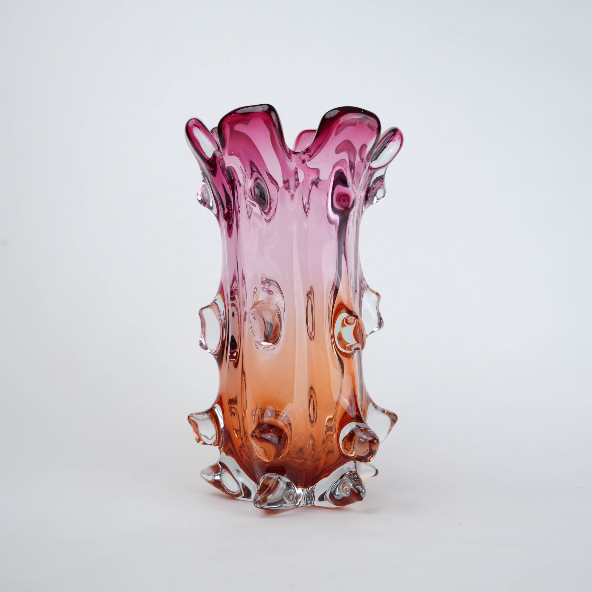 Pink and amber gradient glass vase with sculpted textured design for modern home decor
