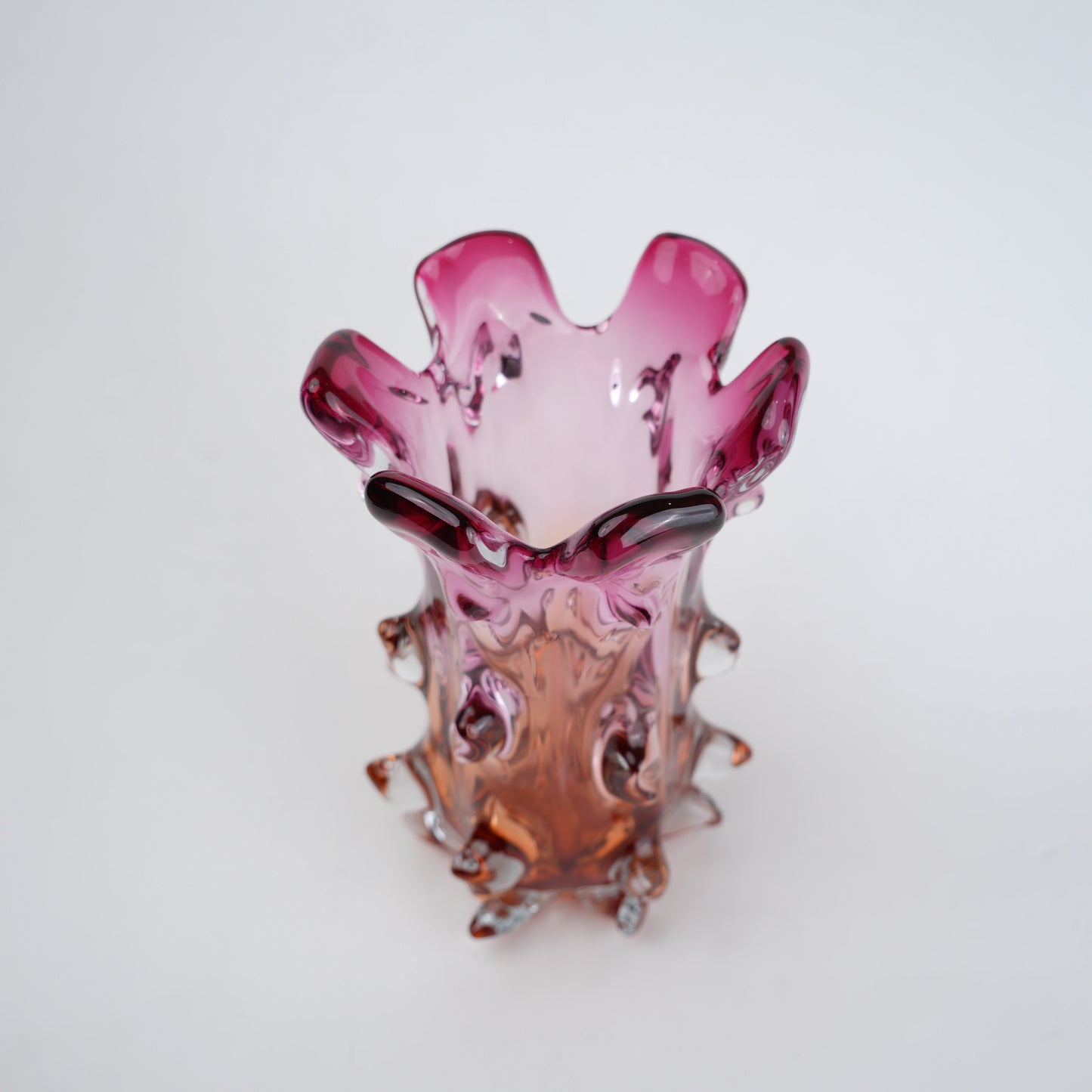 Pink and amber gradient glass vase with sculpted textured design for modern home decor