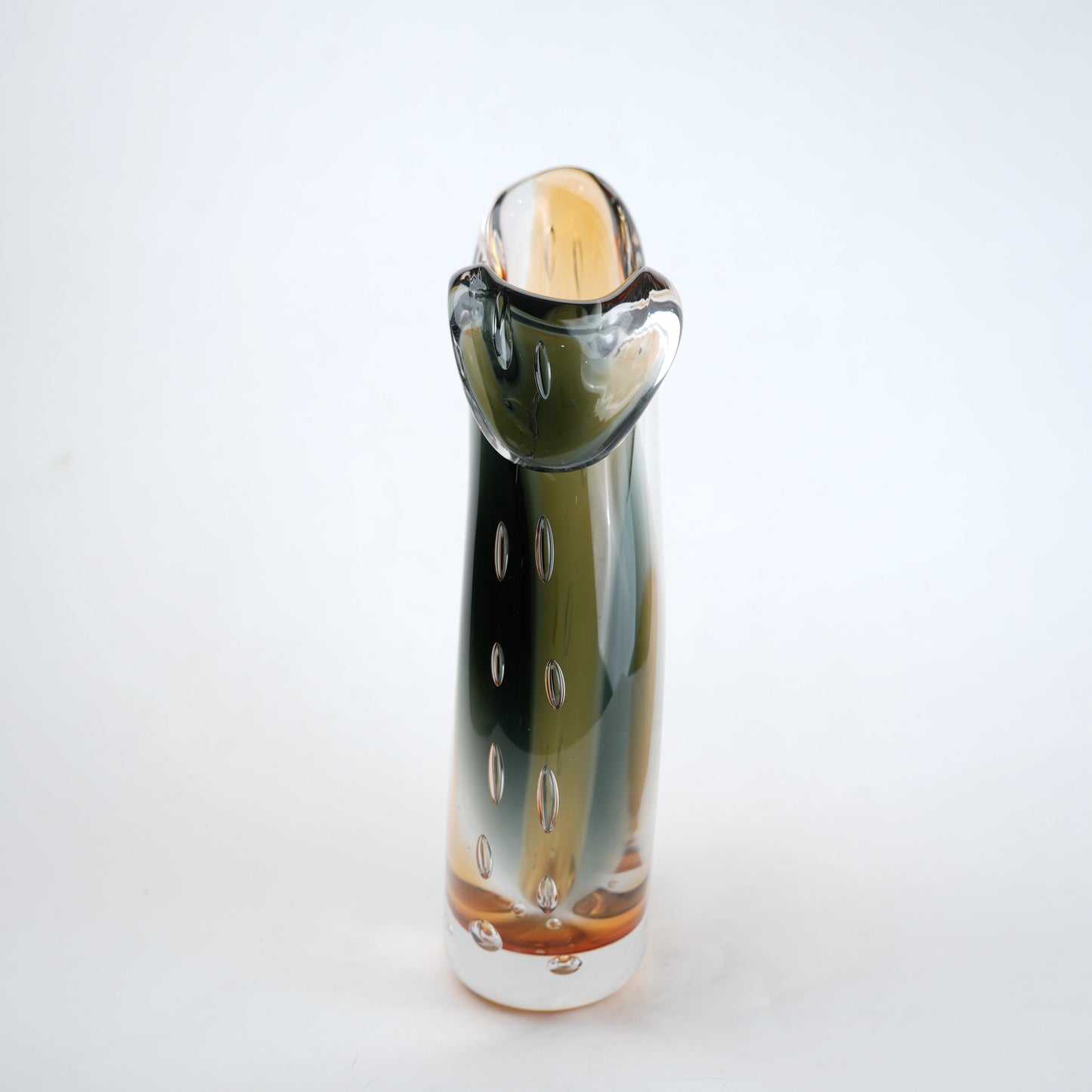 Glass bottle with a unique design on a white background