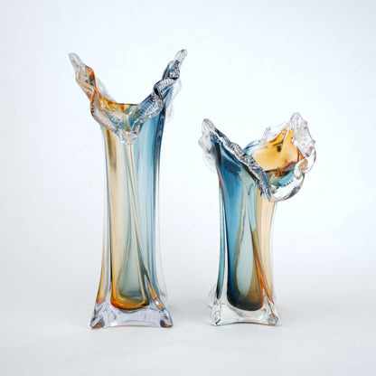 Dual tone blue and amber art glass vase with sculpted rim available in tall and small sizes