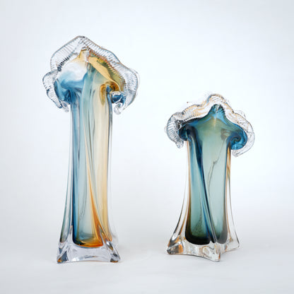 Dual tone blue and amber art glass vase with sculpted rim available in tall and small sizes