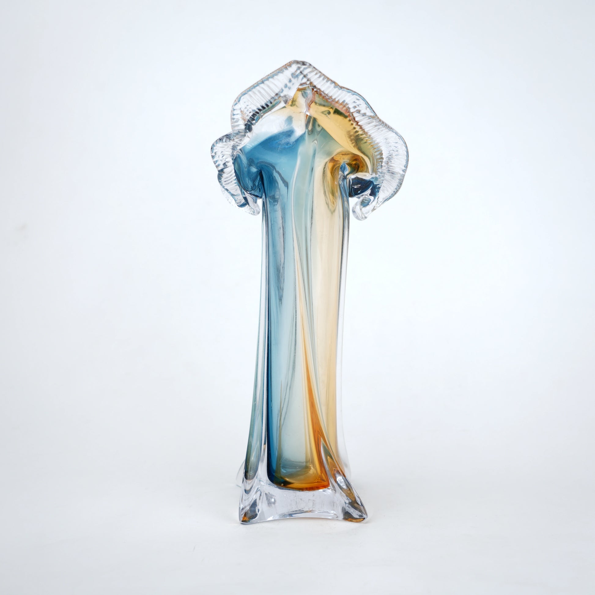 Dual tone blue and amber art glass vase with sculpted rim available in tall and small sizes