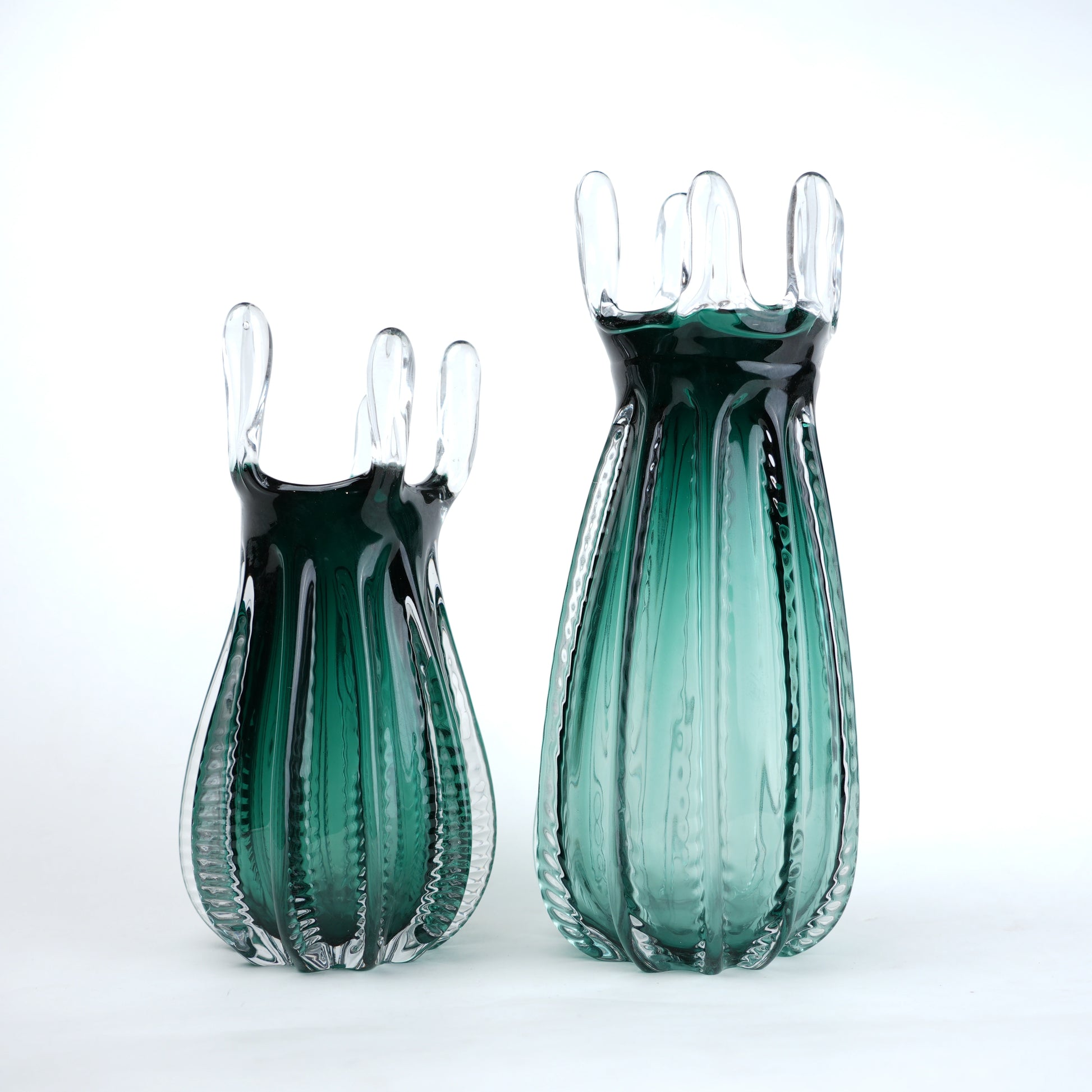 Emerald green glass vase with crown rim design available in small and big sizes for modern decor
