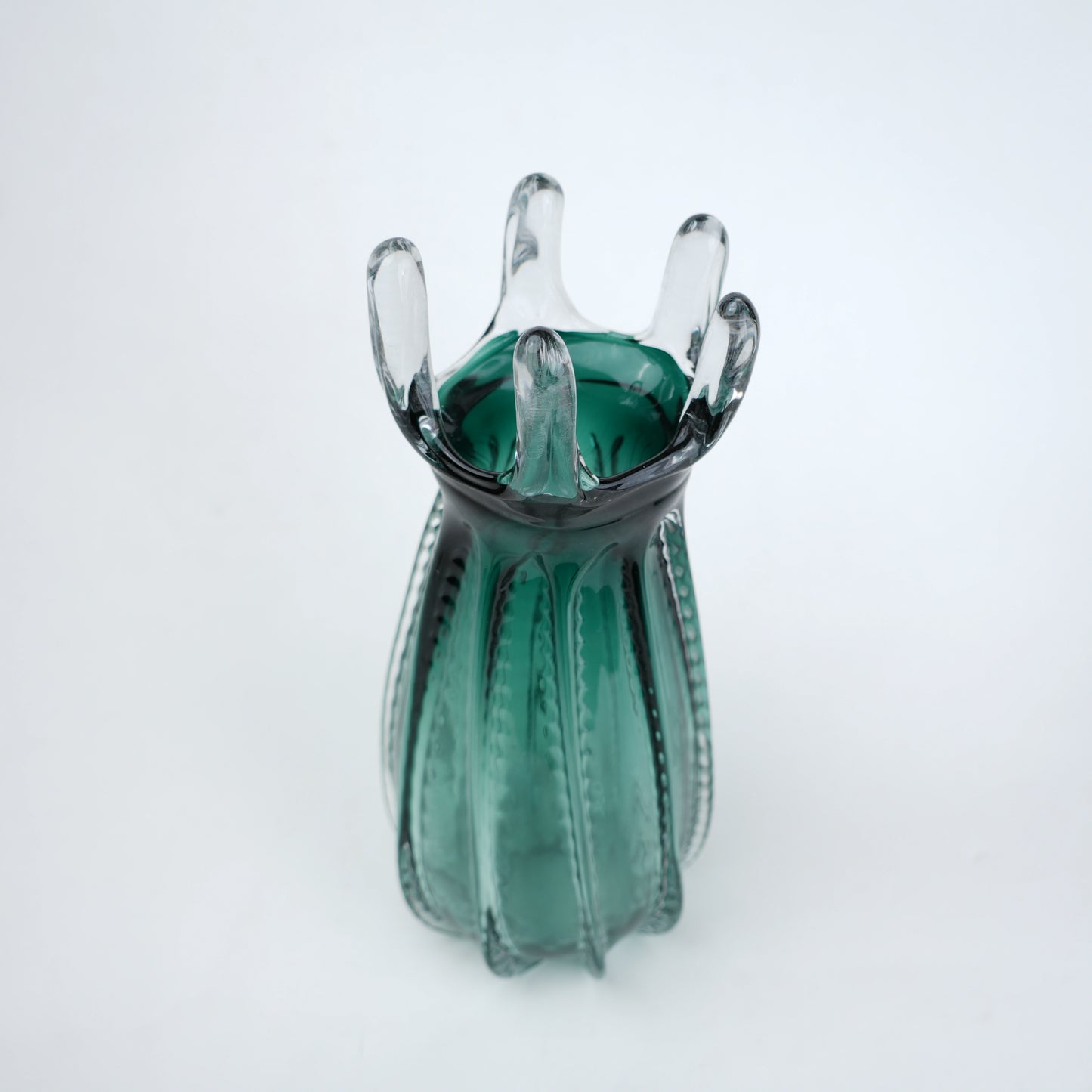 Emerald green glass vase with crown rim design available in small and big sizes for modern decor