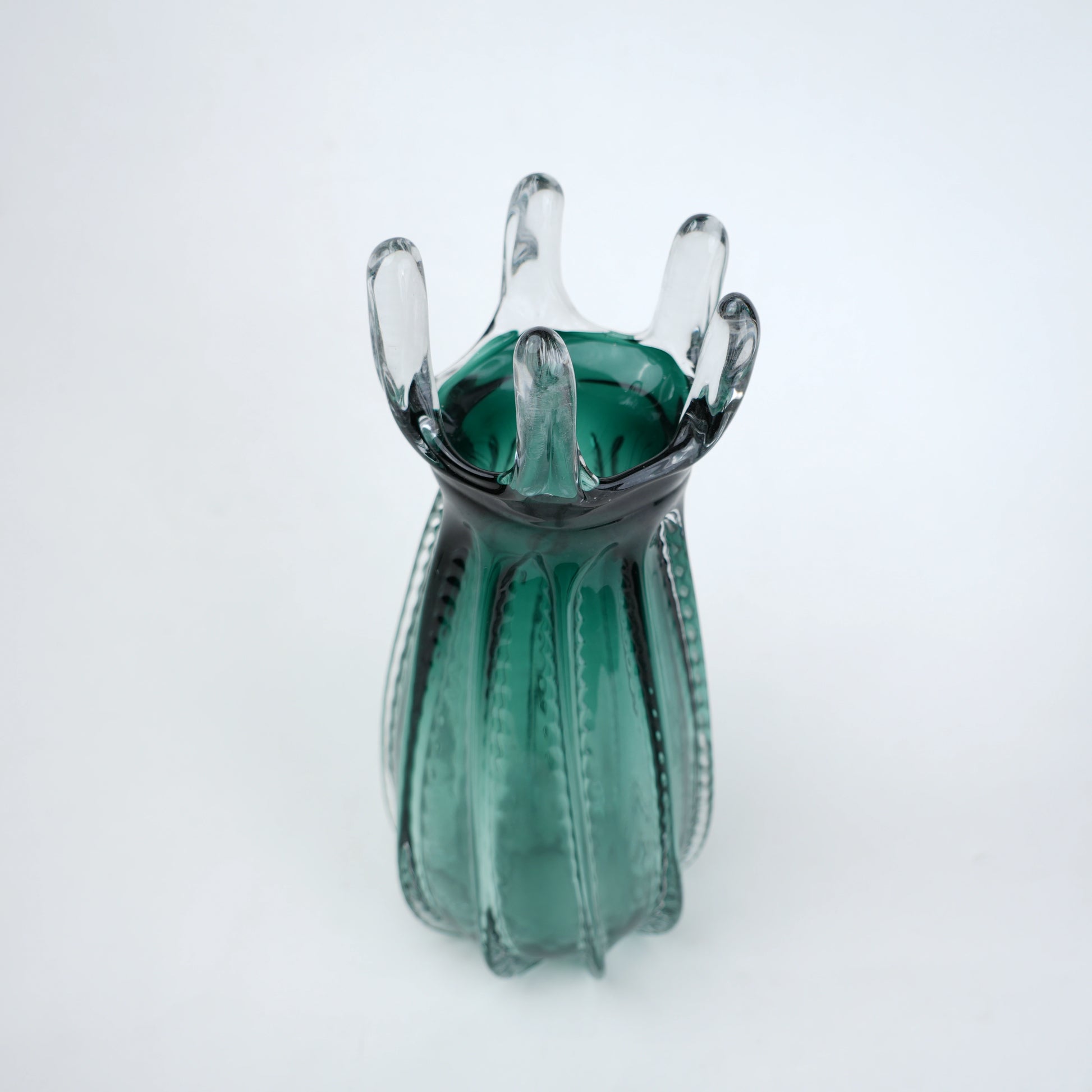 Emerald green glass vase with crown rim design available in small and big sizes for modern decor