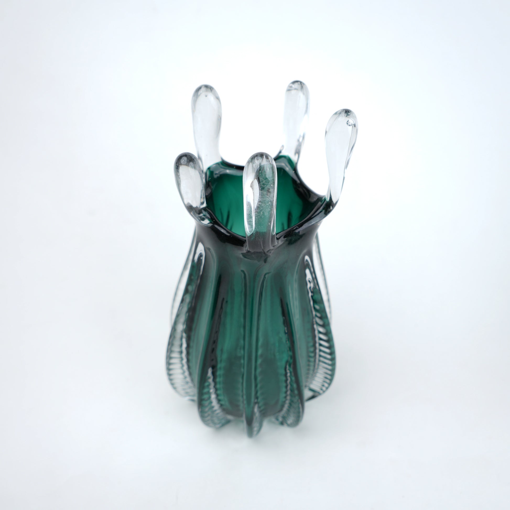 Emerald green glass vase with crown rim design available in small and big sizes for modern decor