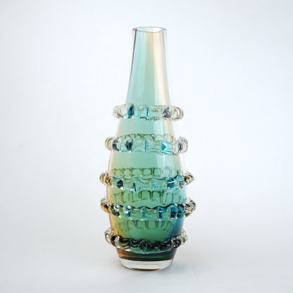 Amber and blue gradient glass vase with ribbed layered design and tall tapered shape