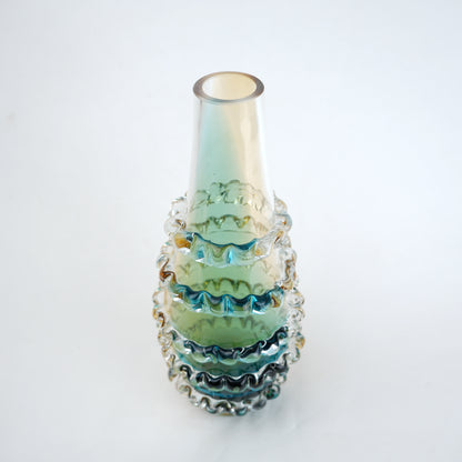 Amber and blue gradient glass vase with ribbed layered design and tall tapered shape