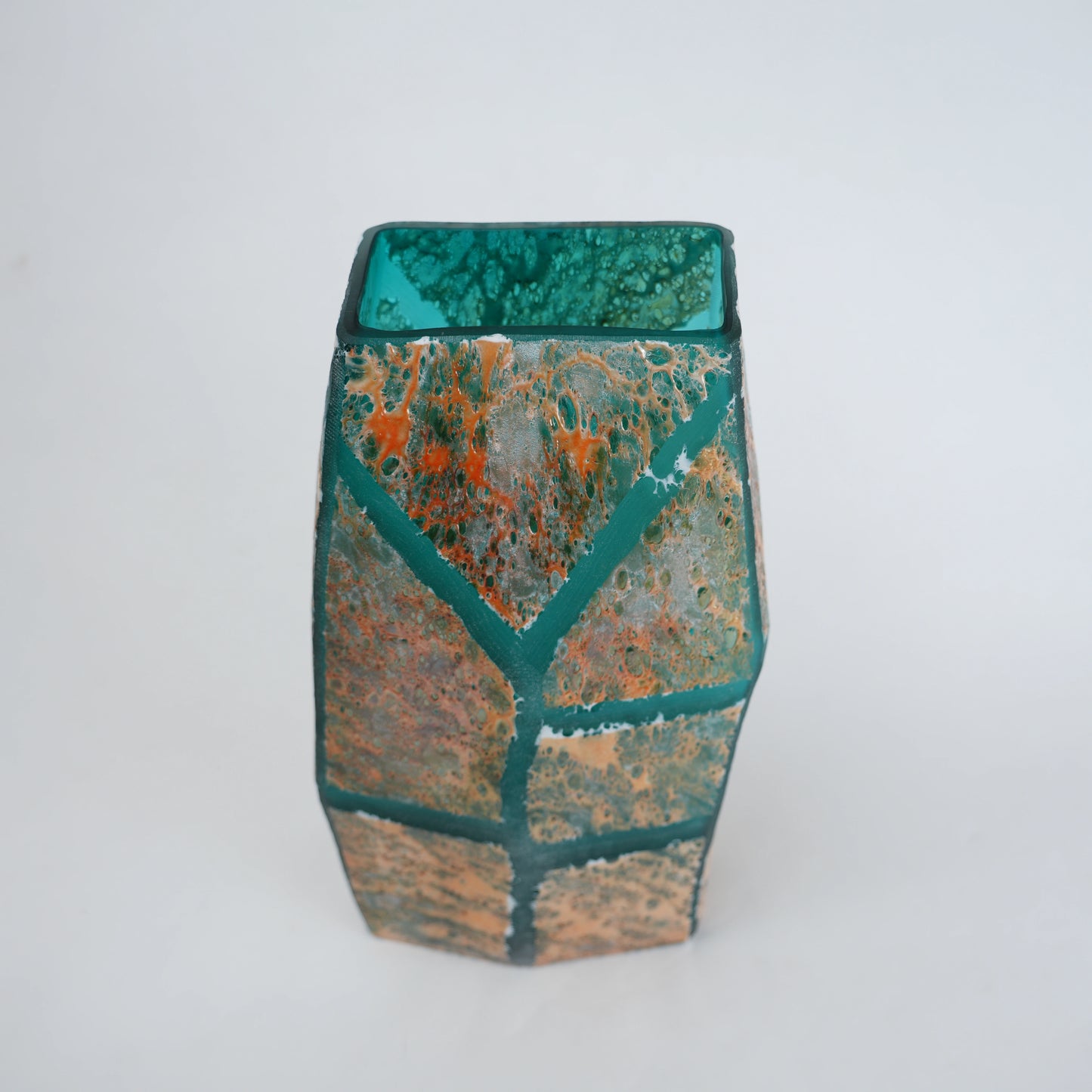 Teal green glass vase with geometric grid design and antique gold textured finish