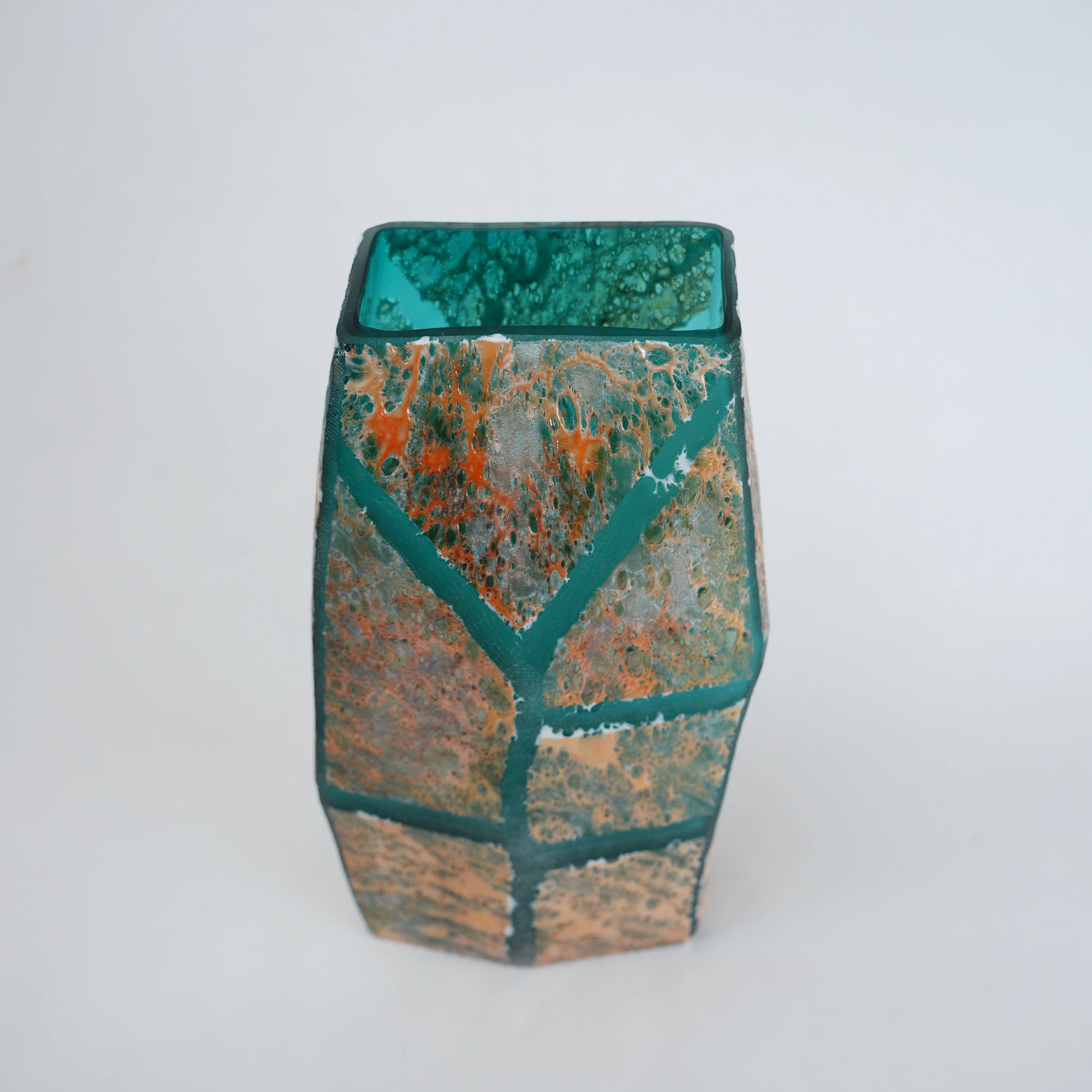 Teal green glass vase with geometric grid design and antique gold textured finish
