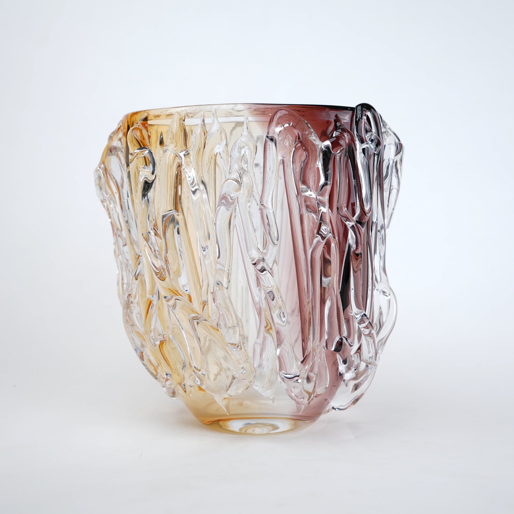 Dual tone glass vase with amber and rose tint and textured molten design in two sizes