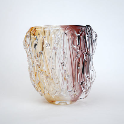 Dual tone glass vase with amber and rose tint and textured molten design in two sizes
