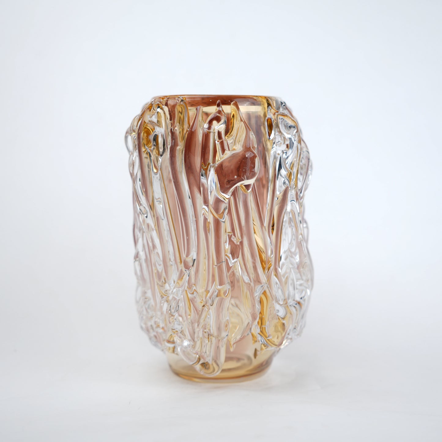 Dual tone glass vase with amber and rose tint and textured molten design in two sizes