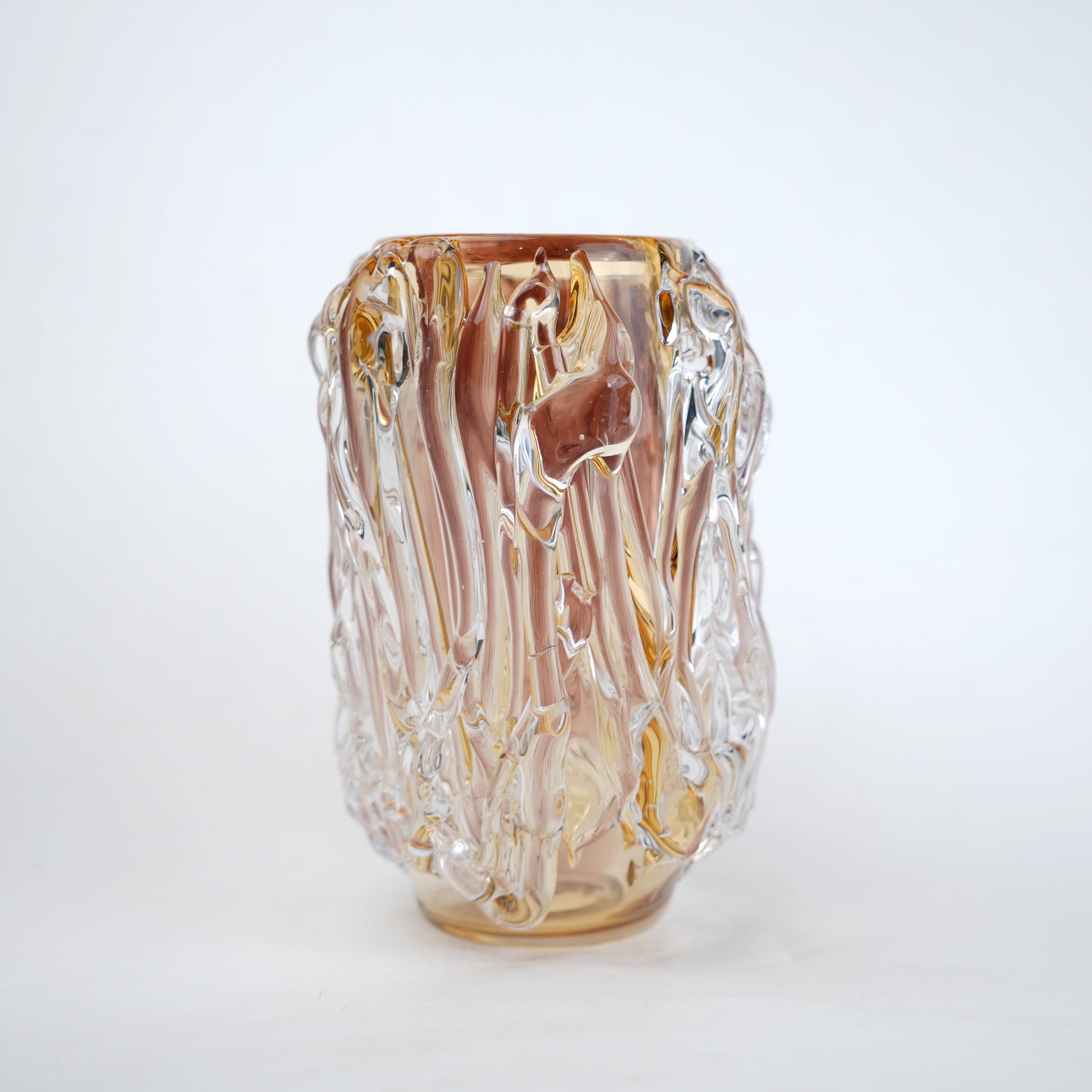 Dual tone glass vase with amber and rose tint and textured molten design in two sizes