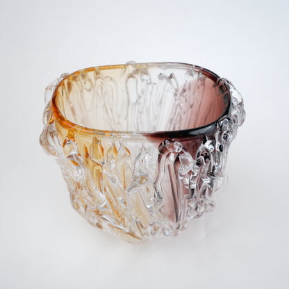 Dual tone glass vase with amber and rose tint and textured molten design in two sizes