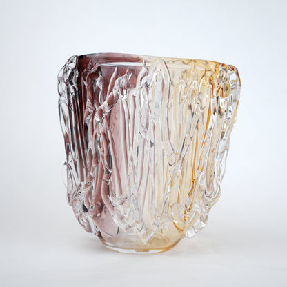 Dual tone glass vase with amber and rose tint and textured molten design in two sizes