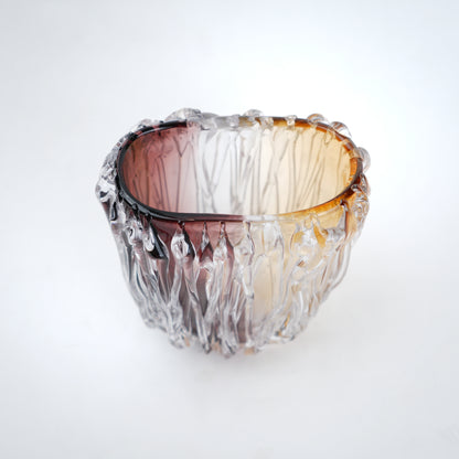 Dual tone glass vase with amber and rose tint and textured molten design in two sizes