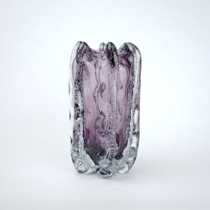 Purple and clear glass vase on a white background