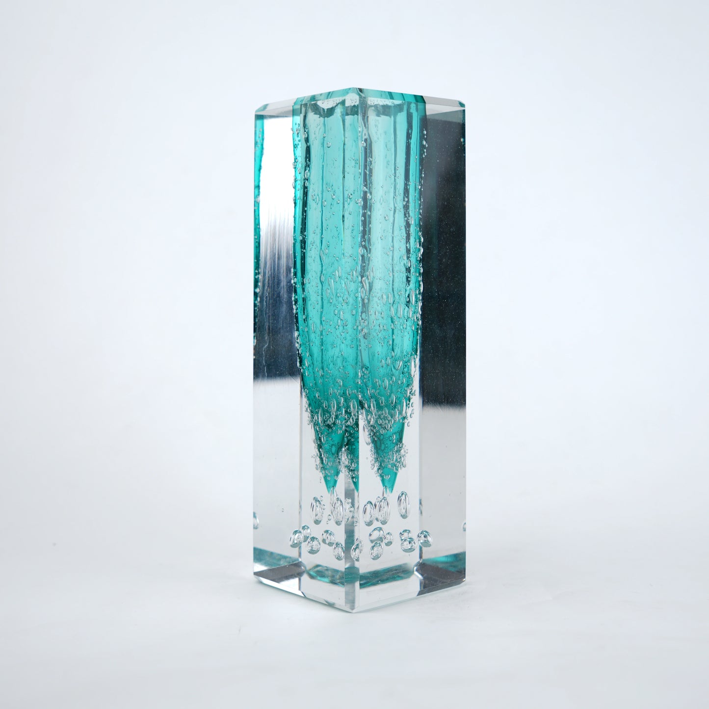 Teal green glass vase with clear rectangular outer body