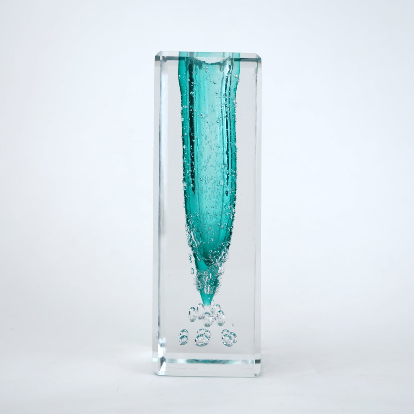 Teal green glass vase with clear rectangular outer body