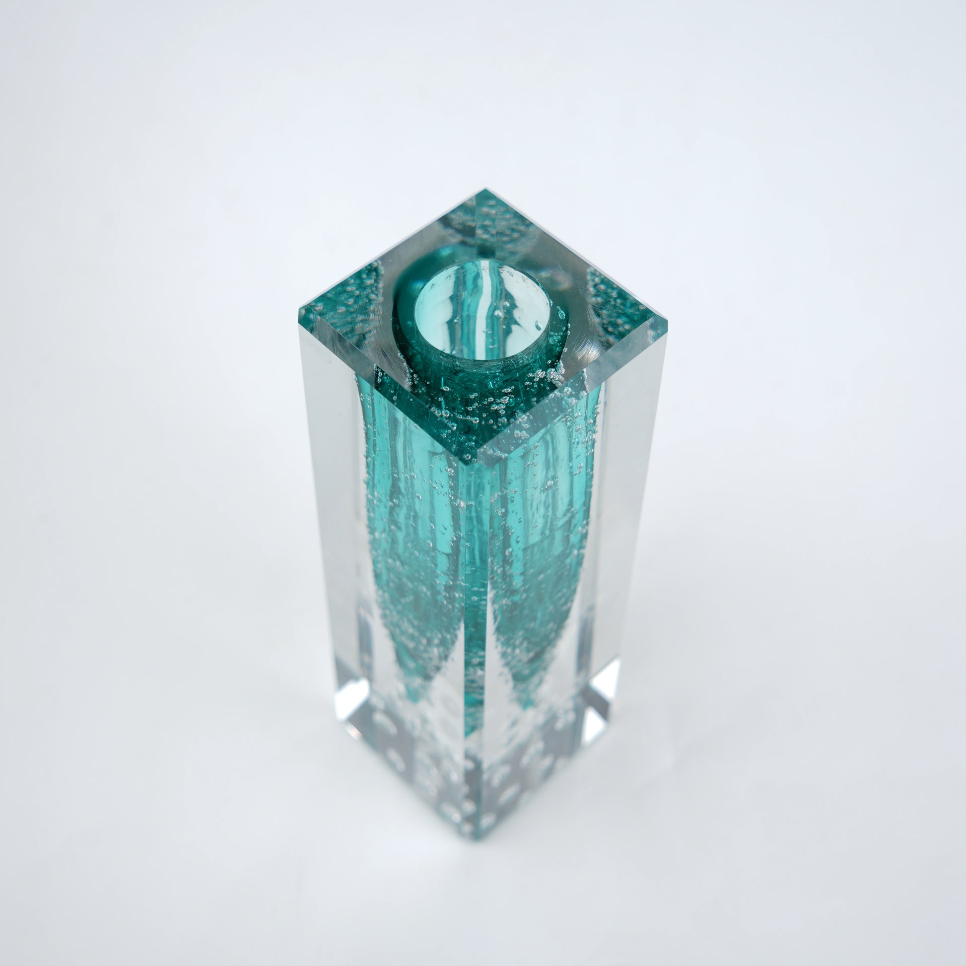 Teal green glass vase with clear rectangular outer body