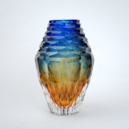 modern statement glass vase with blue and amber tones for interiors