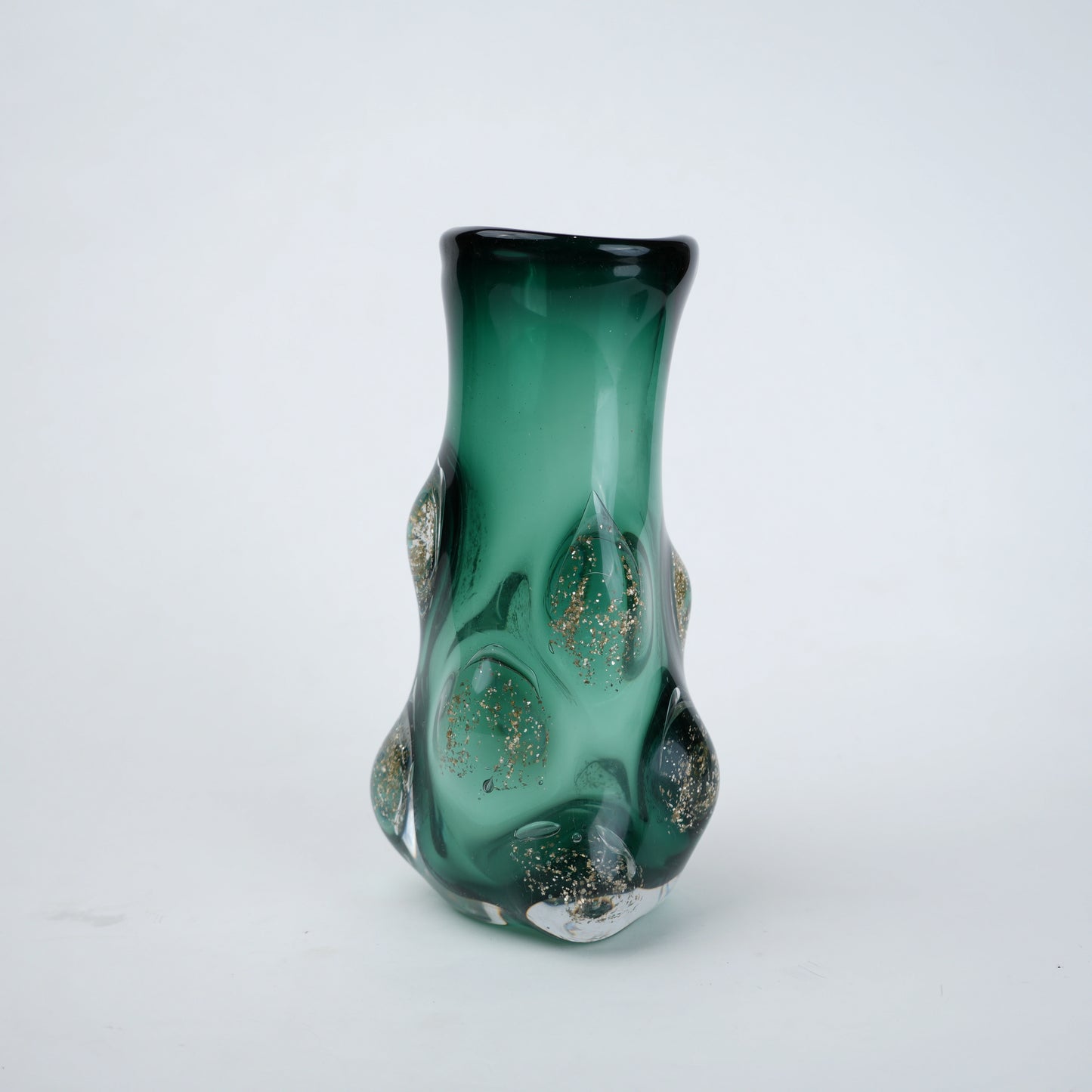 Modern emerald glass vase with raised rounded detailing and gradient green finish designed for contemporary home decor styling