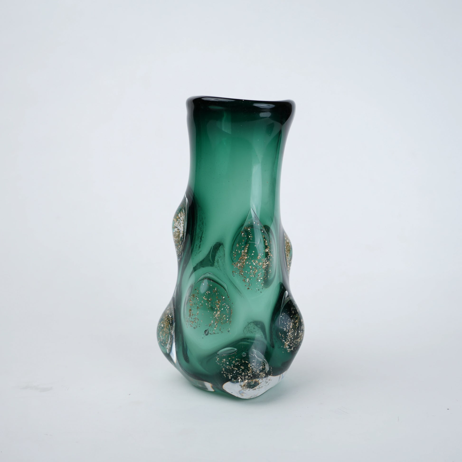 Modern emerald glass vase with raised rounded detailing and gradient green finish designed for contemporary home decor styling