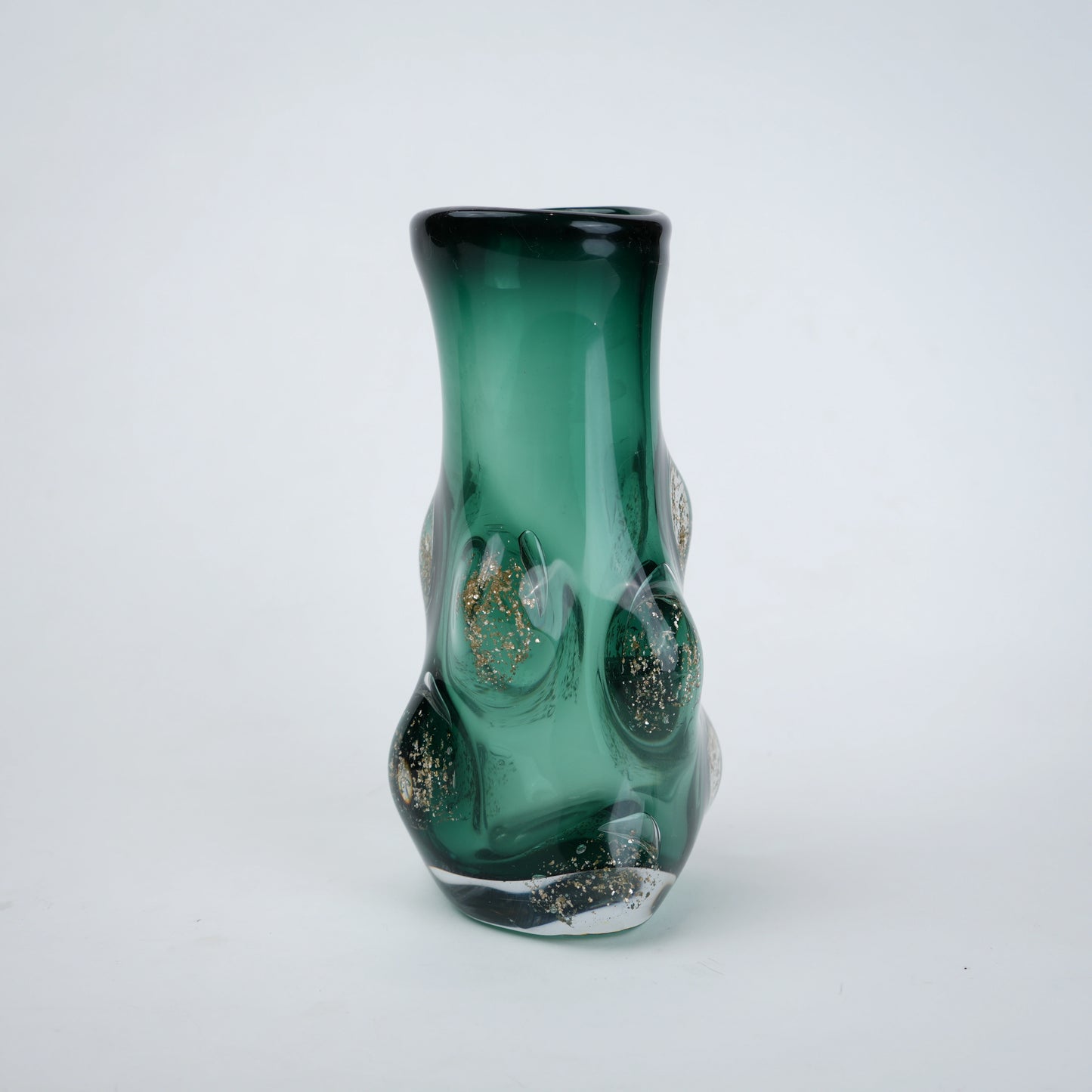 Luxury emerald green glass vase with artistic raised texture and glossy gradient surface for modern tabletop and shelf decor