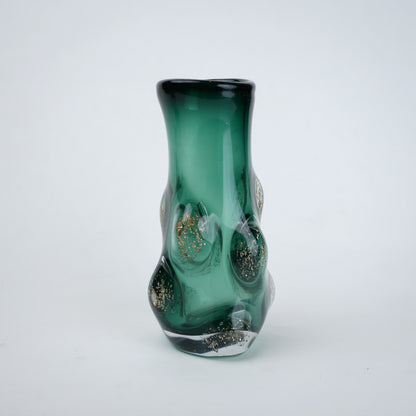Luxury emerald green glass vase with artistic raised texture and glossy gradient surface for modern tabletop and shelf decor