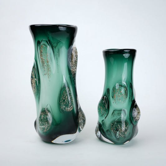 Emerald green glass decorative vase with glossy finish featuring raised textured bubble detailing and gradient color with flared opening