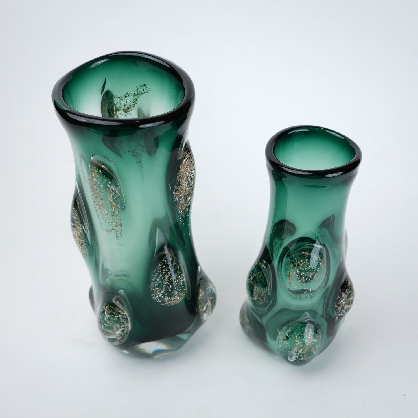 Emerald green glass decorative vase with glossy finish featuring raised textured bubble detailing and gradient color with flared opening