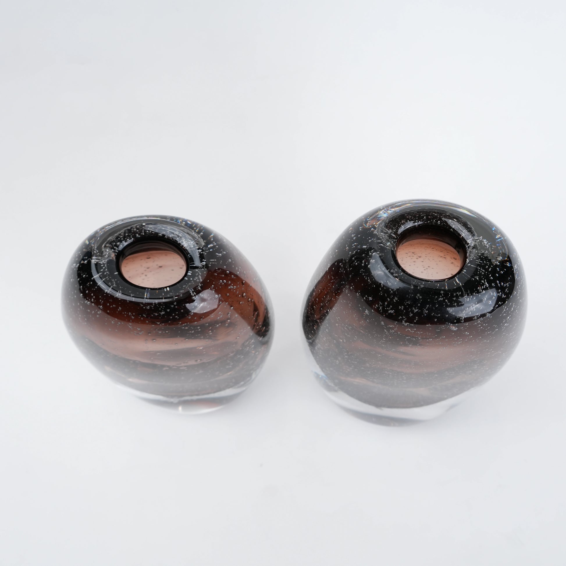 Amber oval vase pair, top-down scale shot