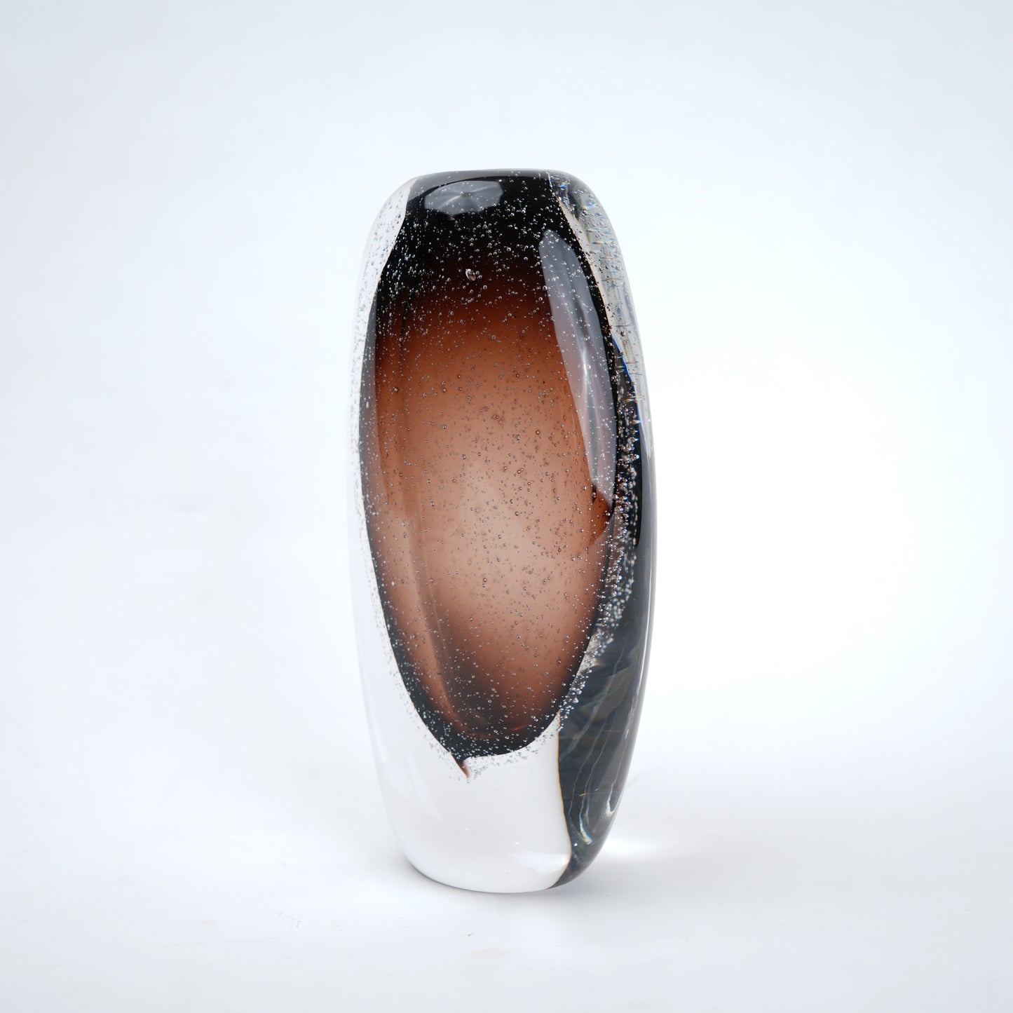Amber oval vase, elongated pebble, side