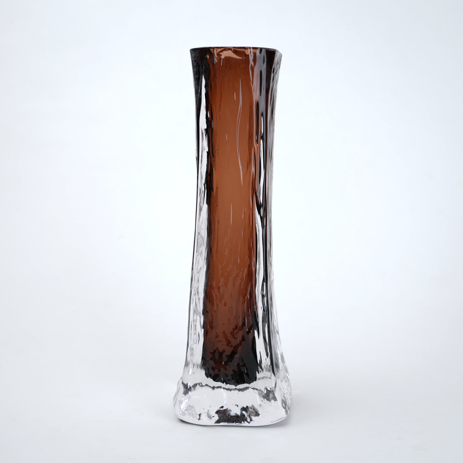 Glass vase with brown and clear design on a white background