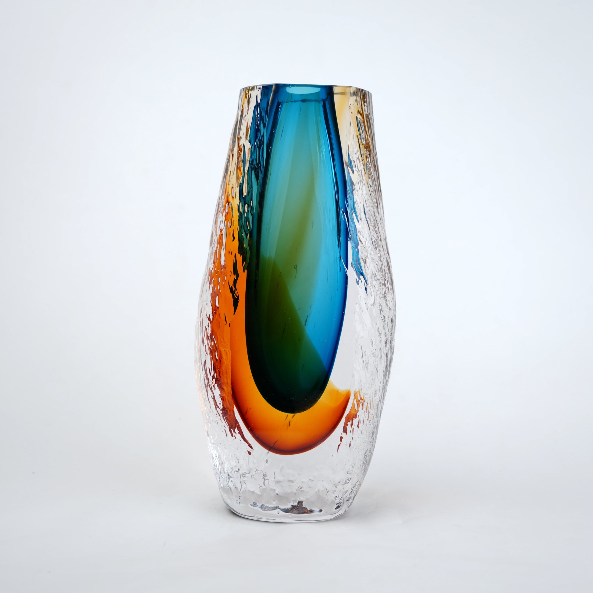 Aqua teal and amber core glass vase with textured clear exterior in two sizes