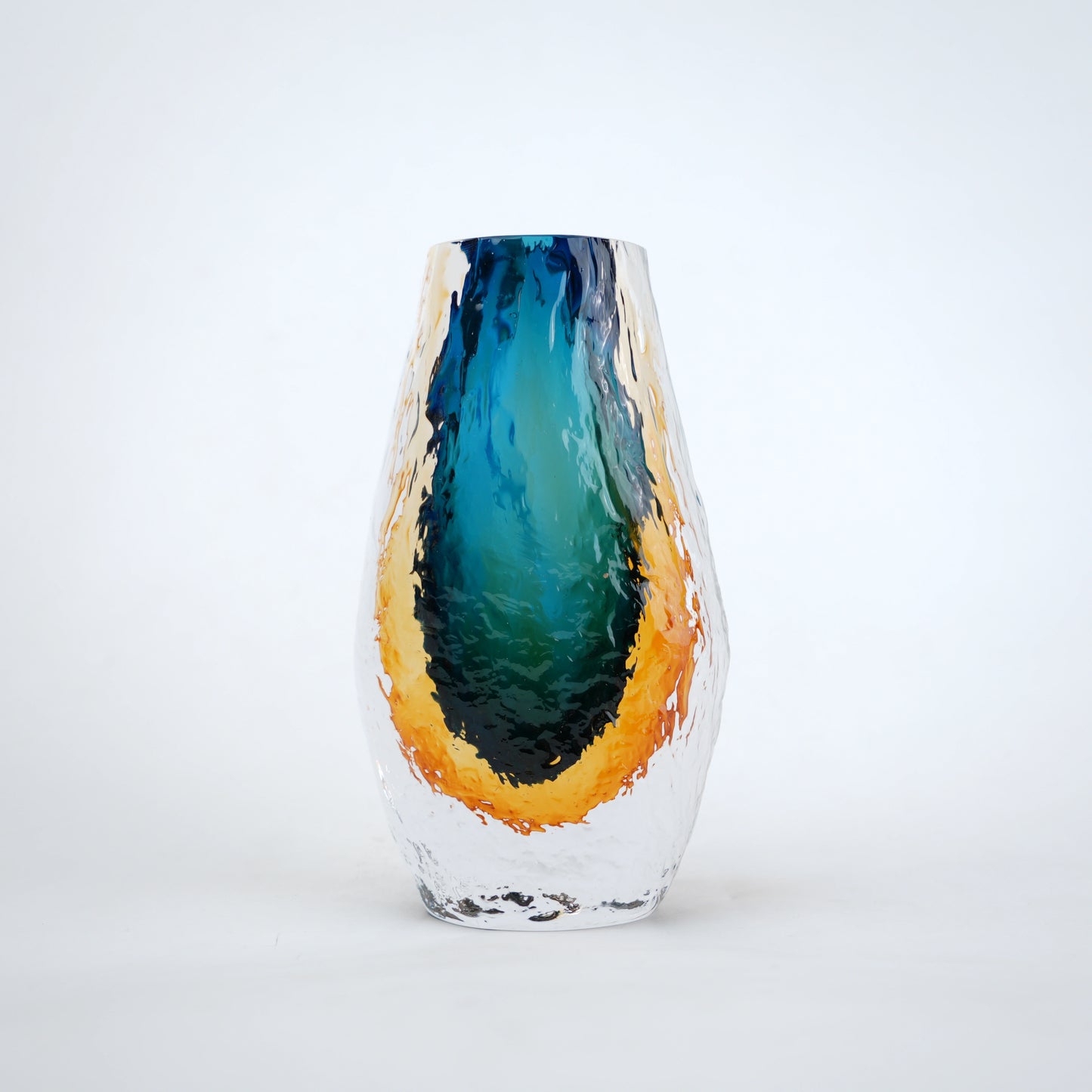 Aqua teal and amber core glass vase with textured clear exterior in two sizes