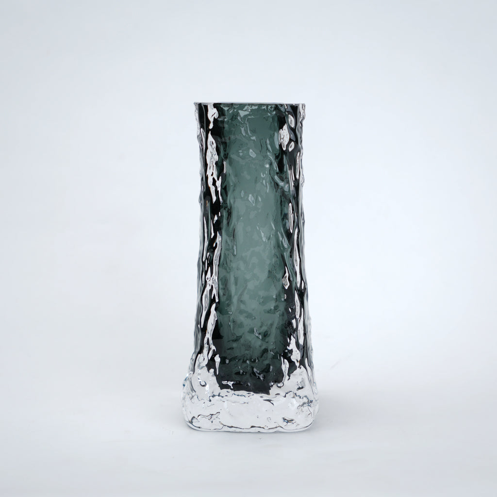 Decorative vase with a textured surface on a white background