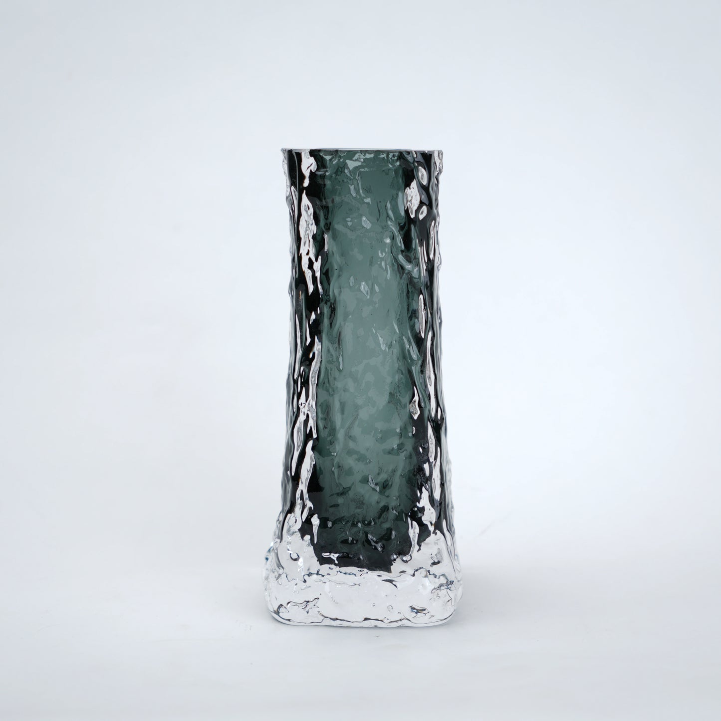 Decorative vase with a textured surface on a white background