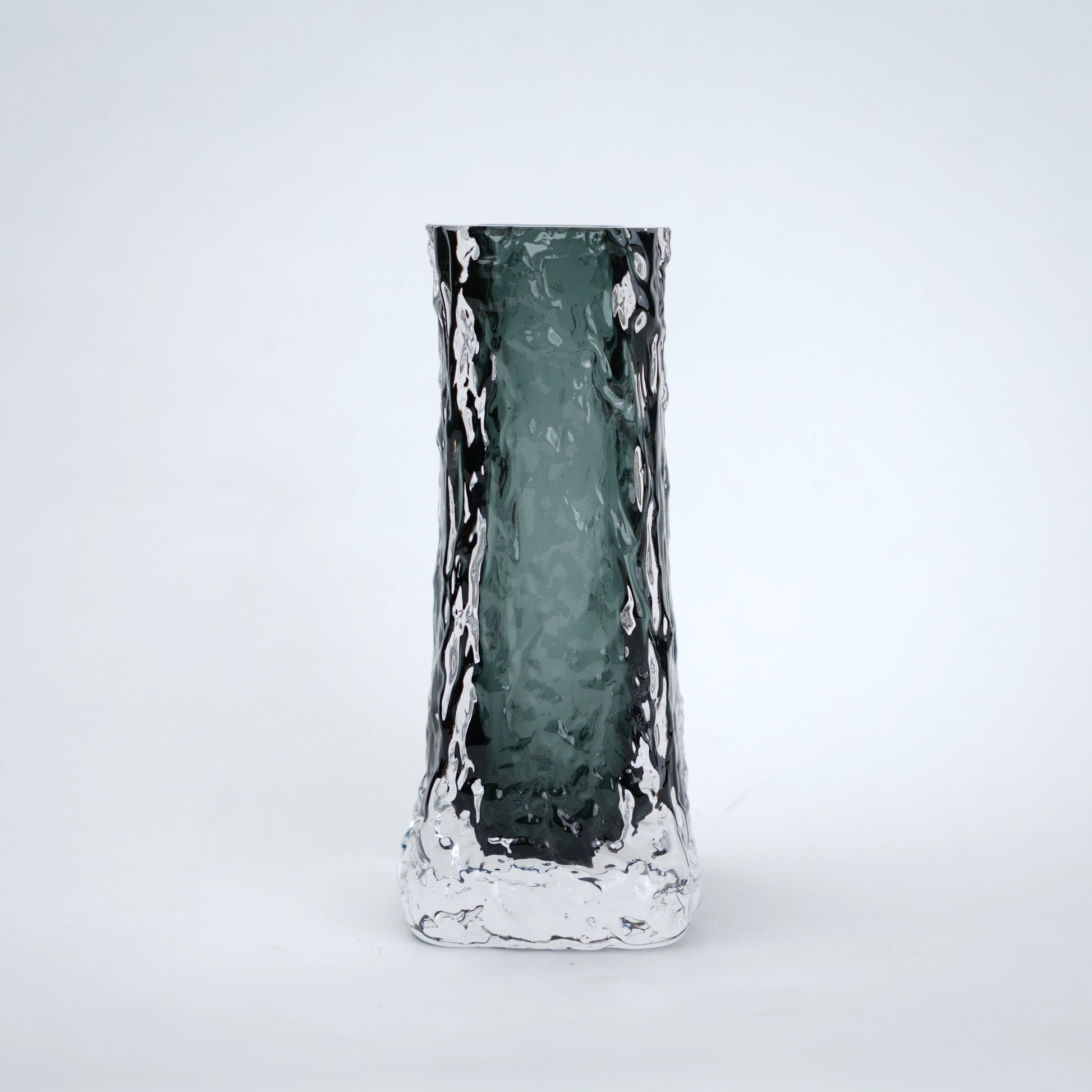 Decorative vase with a textured surface on a white background