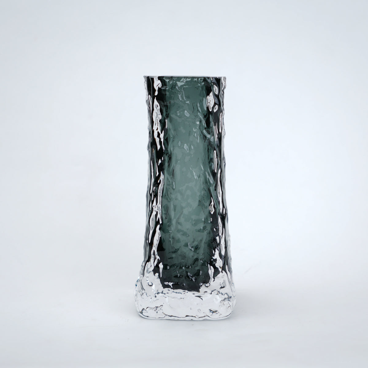 Decorative vase with a textured surface on a white background