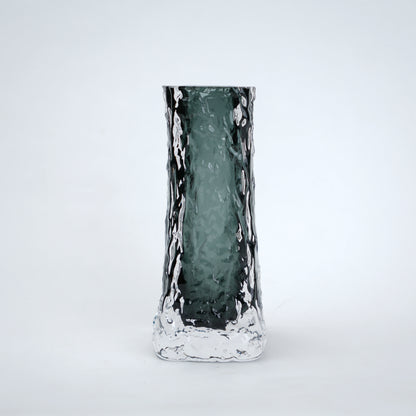 Decorative vase with a textured surface on a white background