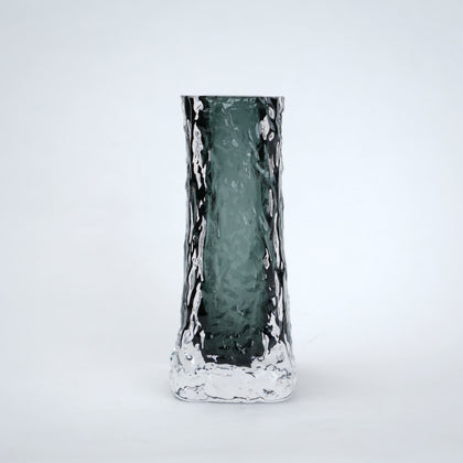 Decorative vase with a textured surface on a white background