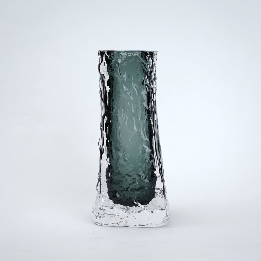 Transparent grey column glass vase with a tall vertical shape and smooth finish, designed for modern home decor and floral arrangements.