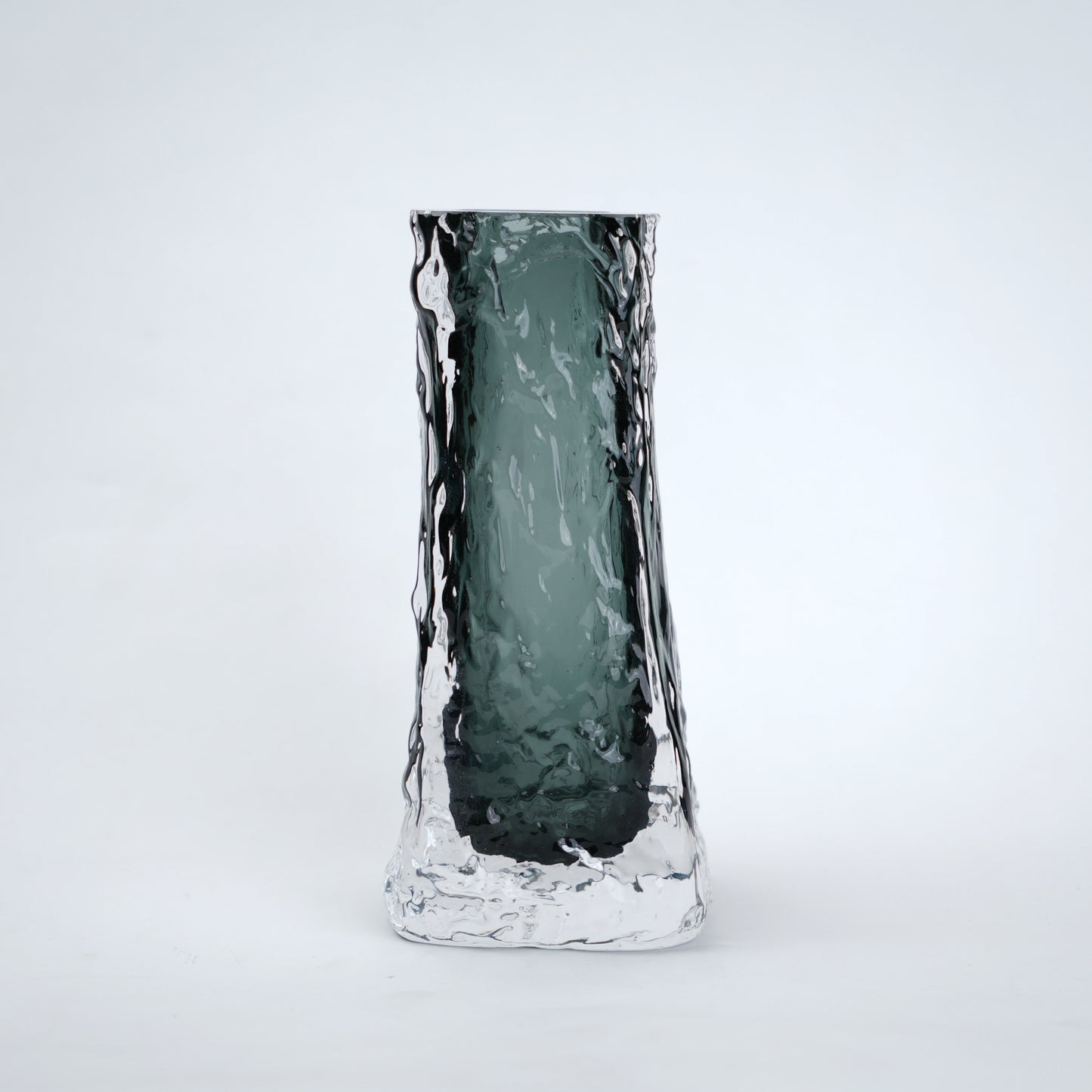 Transparent grey column glass vase with a tall vertical shape and smooth finish, designed for modern home decor and floral arrangements.