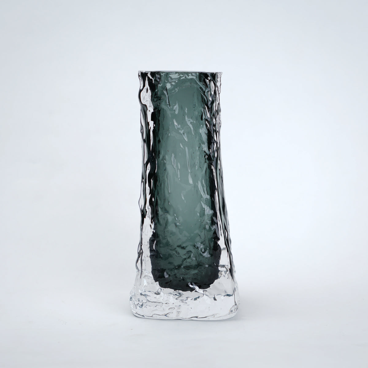 Transparent grey column glass vase with a tall vertical shape and smooth finish, designed for modern home decor and floral arrangements.